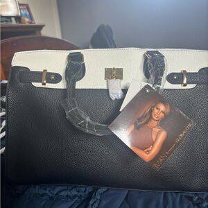 Black and white handbag with shoulder strap